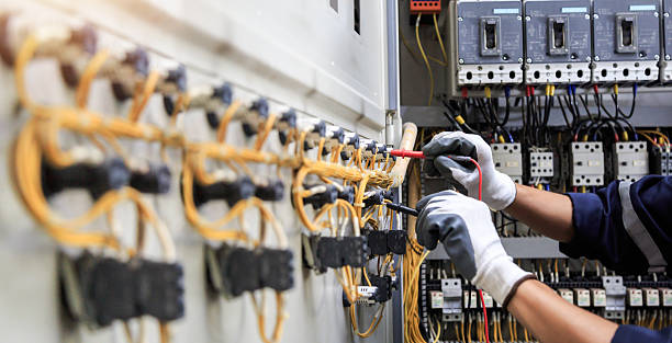 Professional Electrical Panel Upgrade technician working in Clayton County County, IA